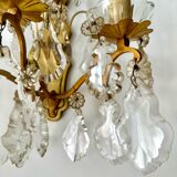 Pair of bronze wall lights and crystal pendants