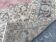 Pale pink rug with medallion
