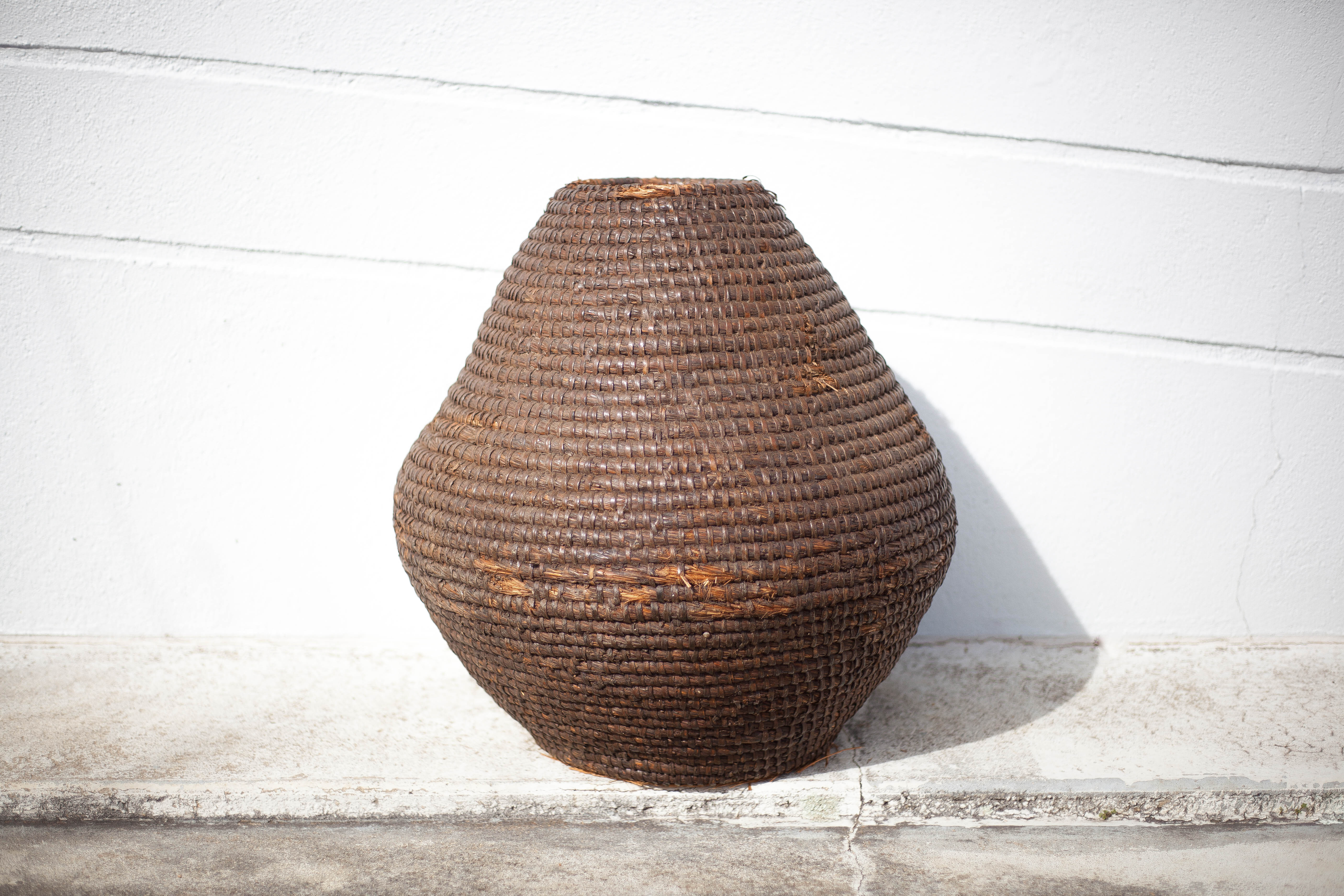 Old basket, straw and bramble bud