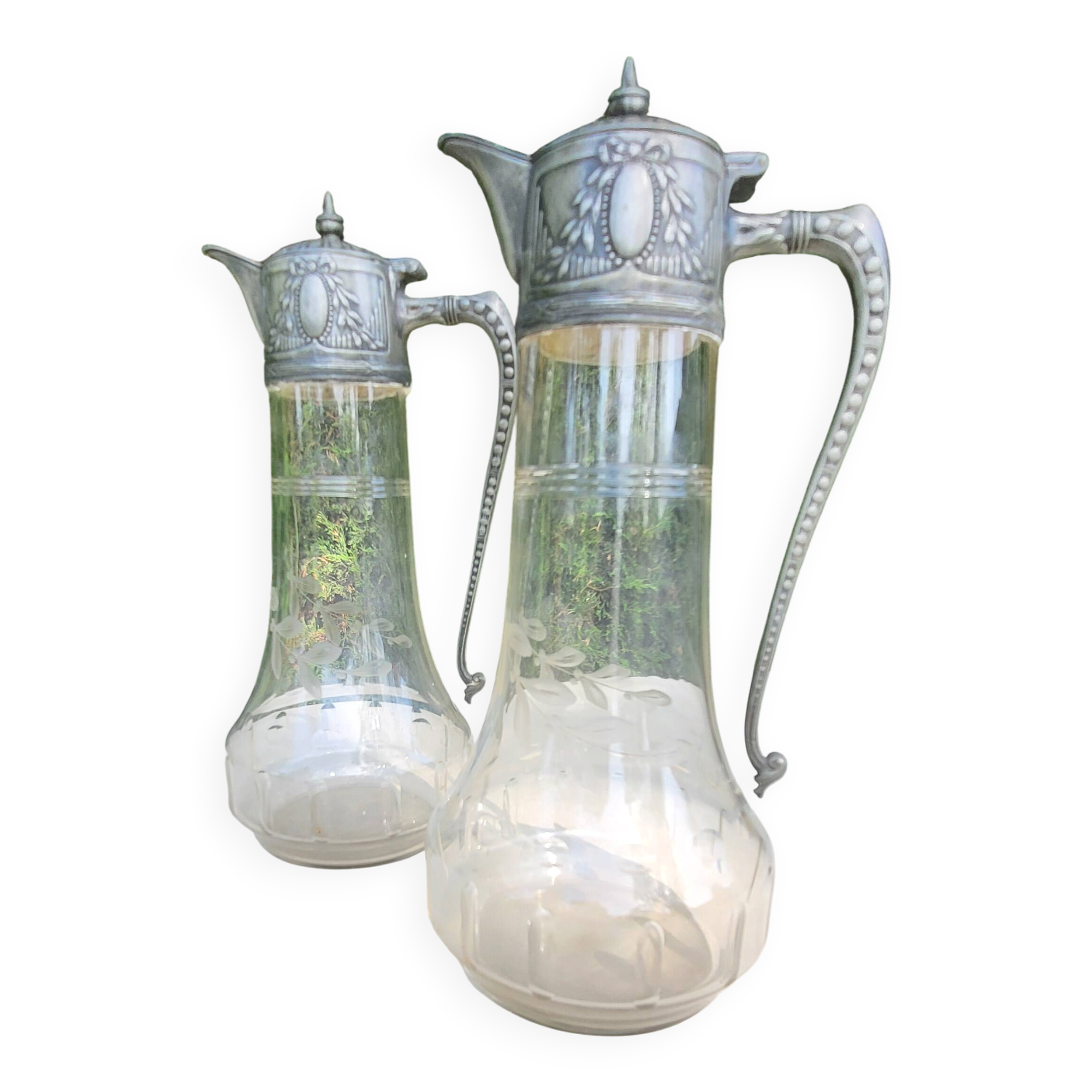 Pair of crystal and pewter jugs