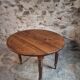 Antique drop-leaf table in French walnut – Oval table with folding extensions on both sides, late 19th century.