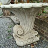 Stone medici in the shape of a cornucopia