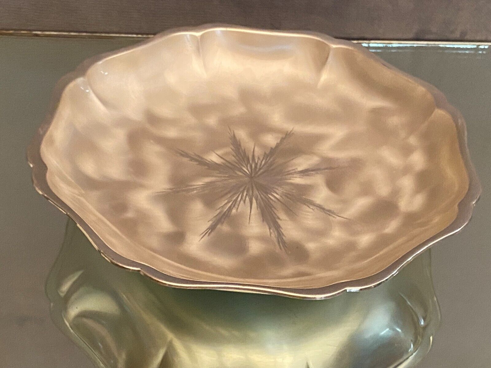 Metal dish with starry decoration