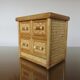 Boite à bijoux commode miniature en rotin années 70