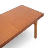 Rectangular dining table with extendable top, 1960s.