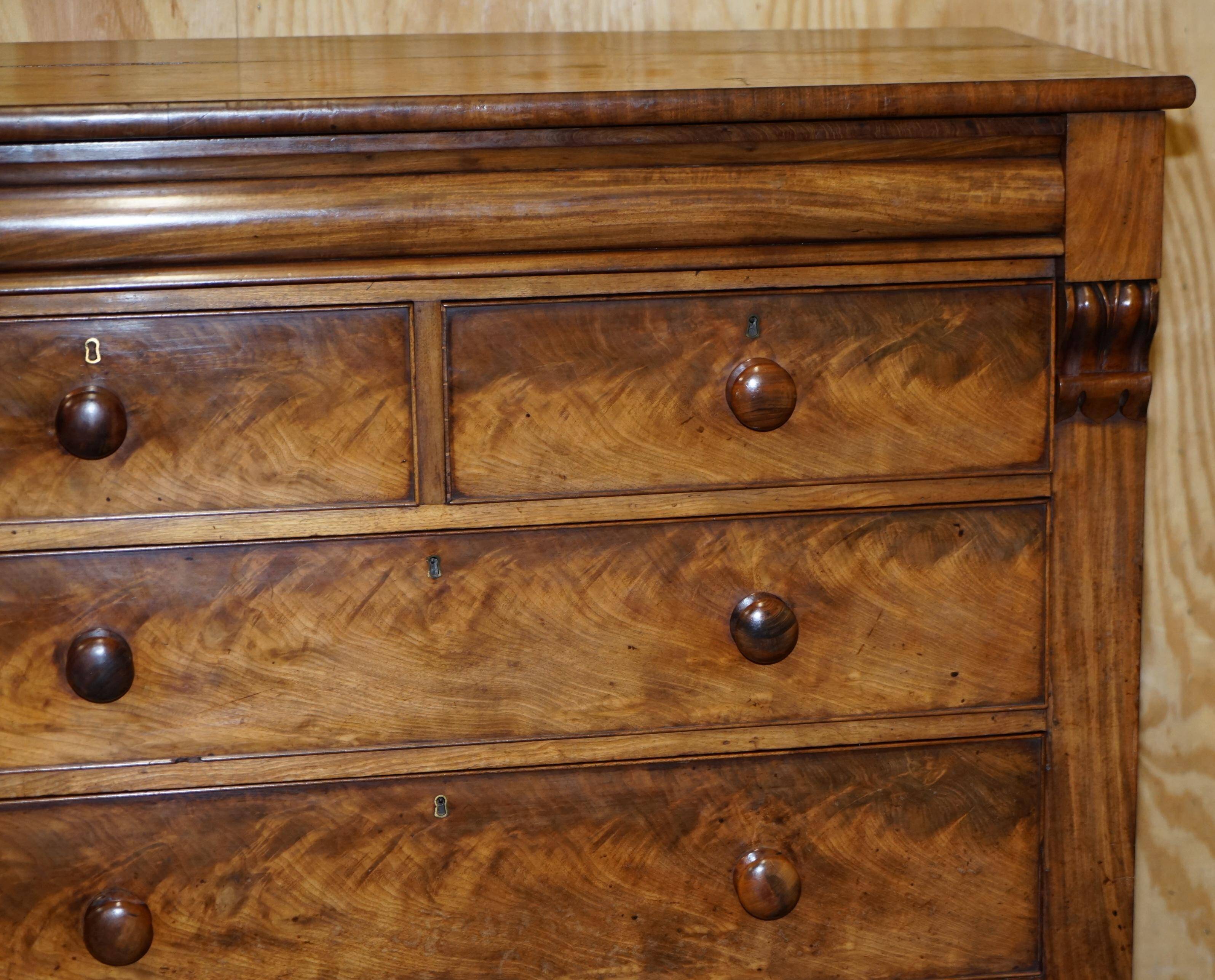 Victorian flamed hardwood commode from the 19th century with a hidden drawer.