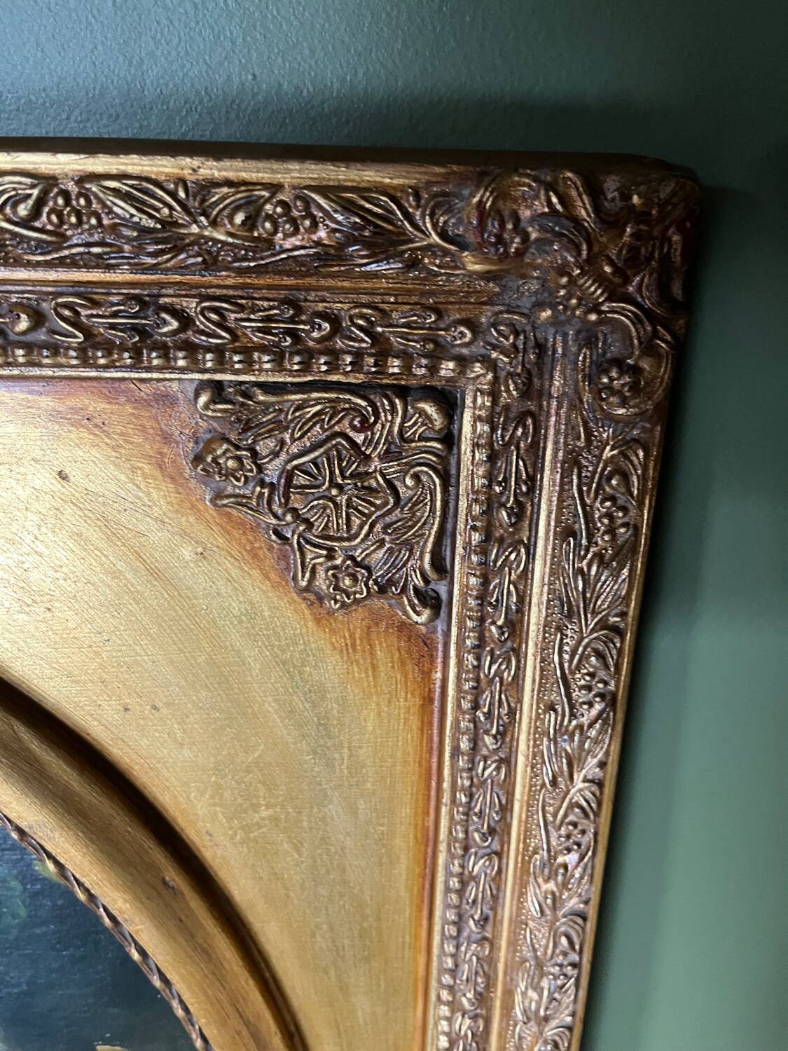 Large still life with white roses in an old gilded oval frame.