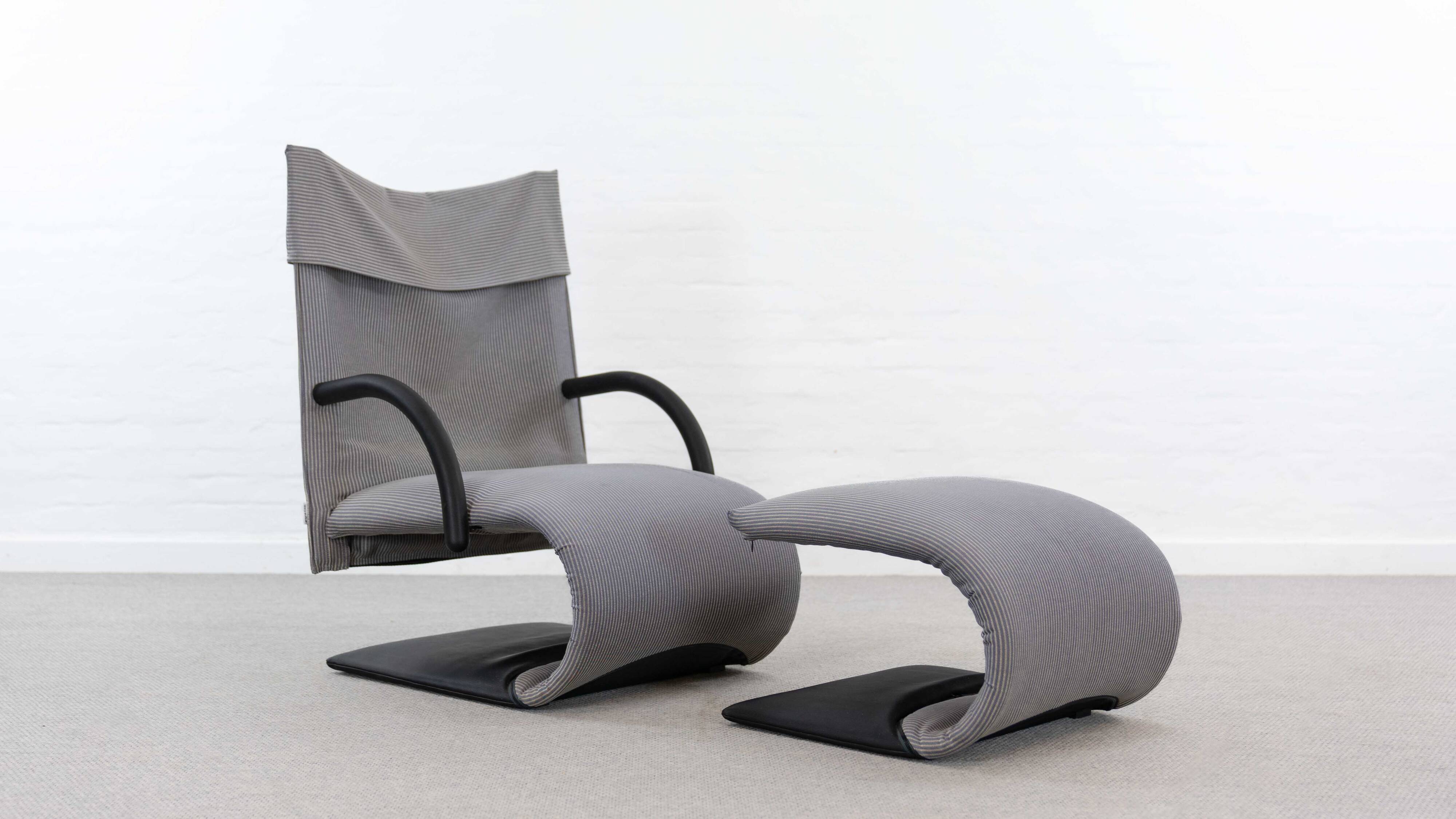 Zen easy chair with footrest by claude brisson for ligne roset