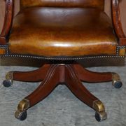 Restored vintage executive chair, leather, oak frame.