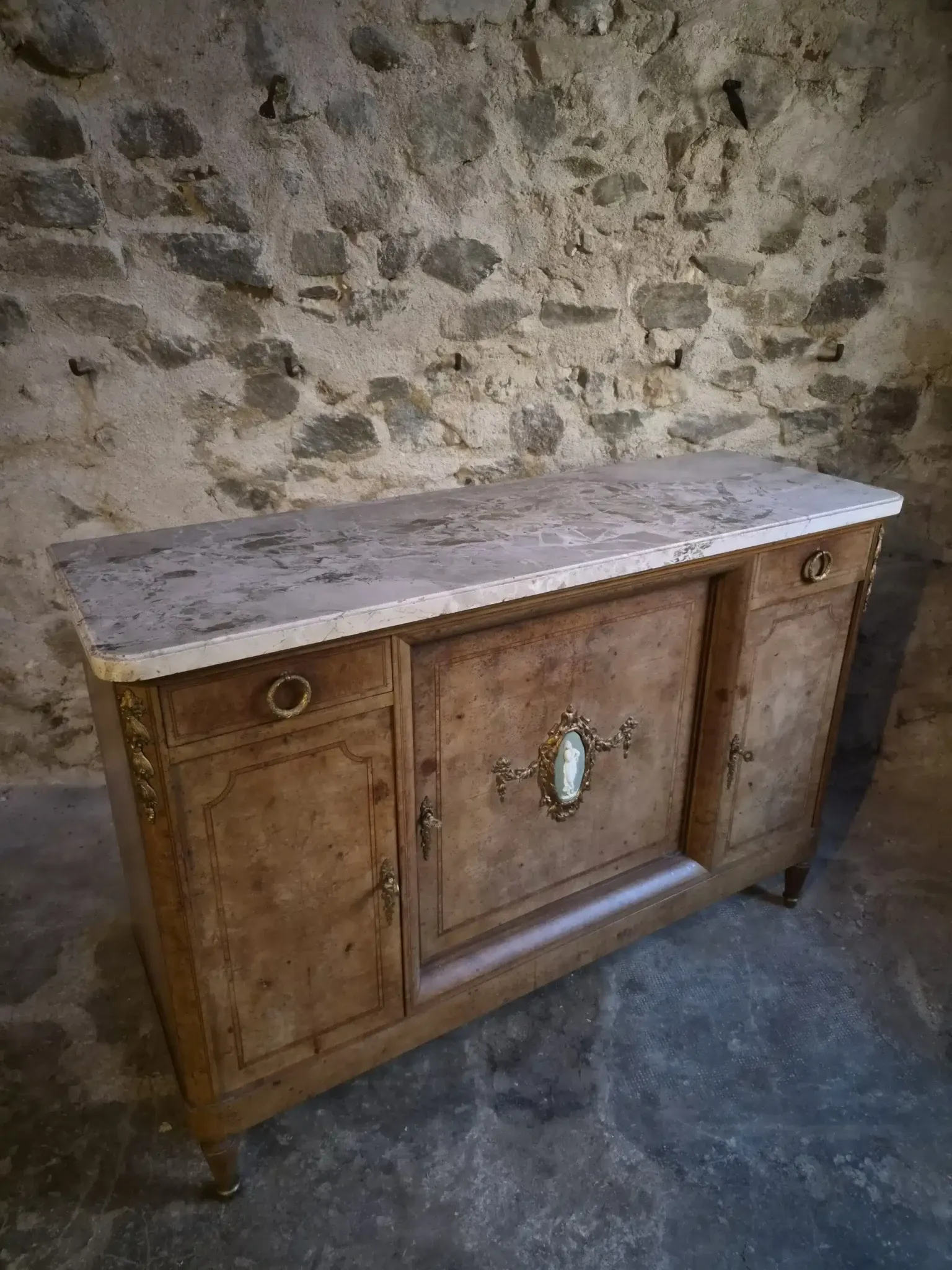 Antique Louis XVI style buffet in burr elm with marble top, late 19th century.