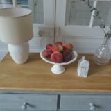 Compact buffet re-enchanted in grey-green, wooden top.