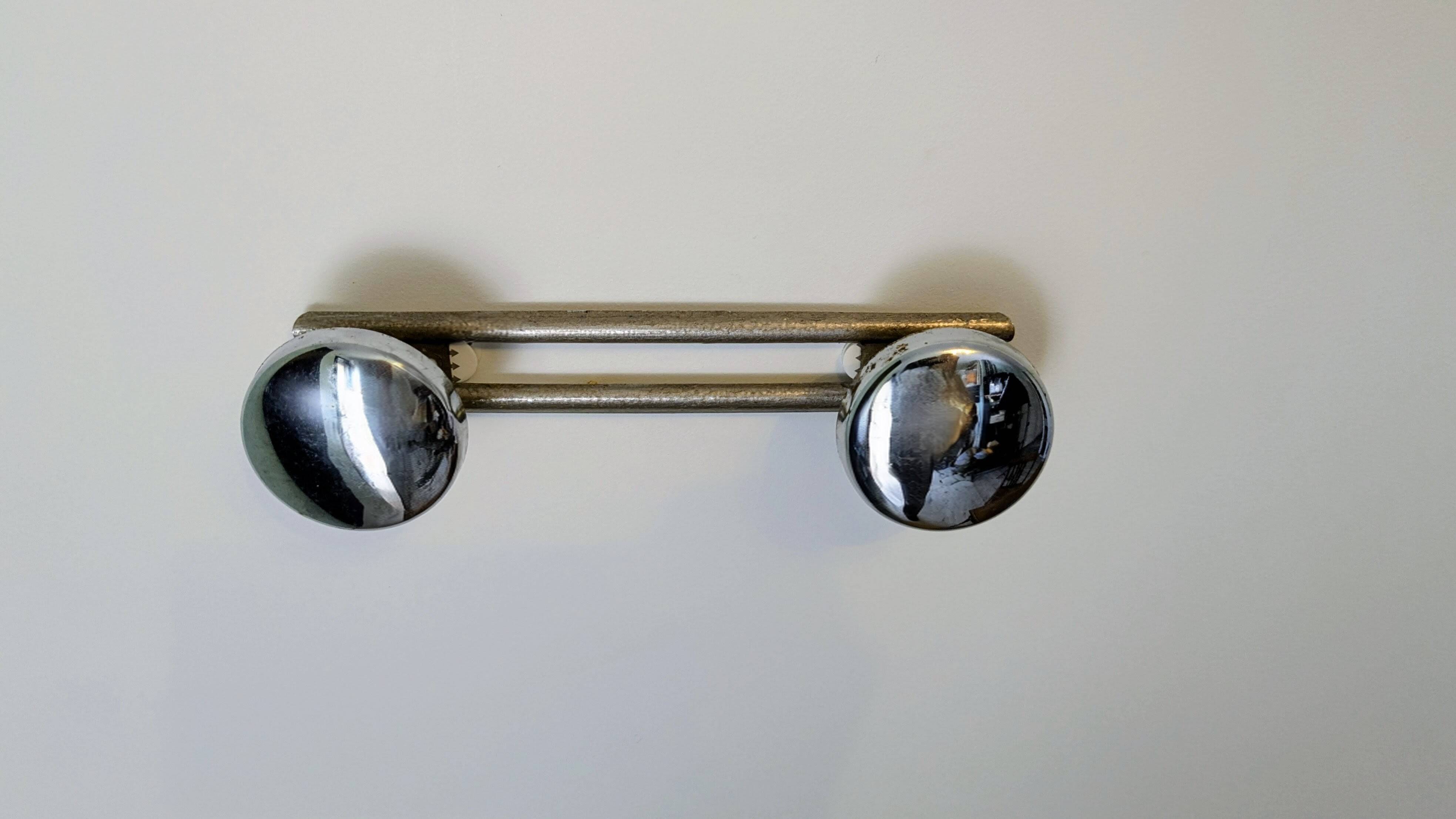 Double wall hook in chrome metal, vintage design.