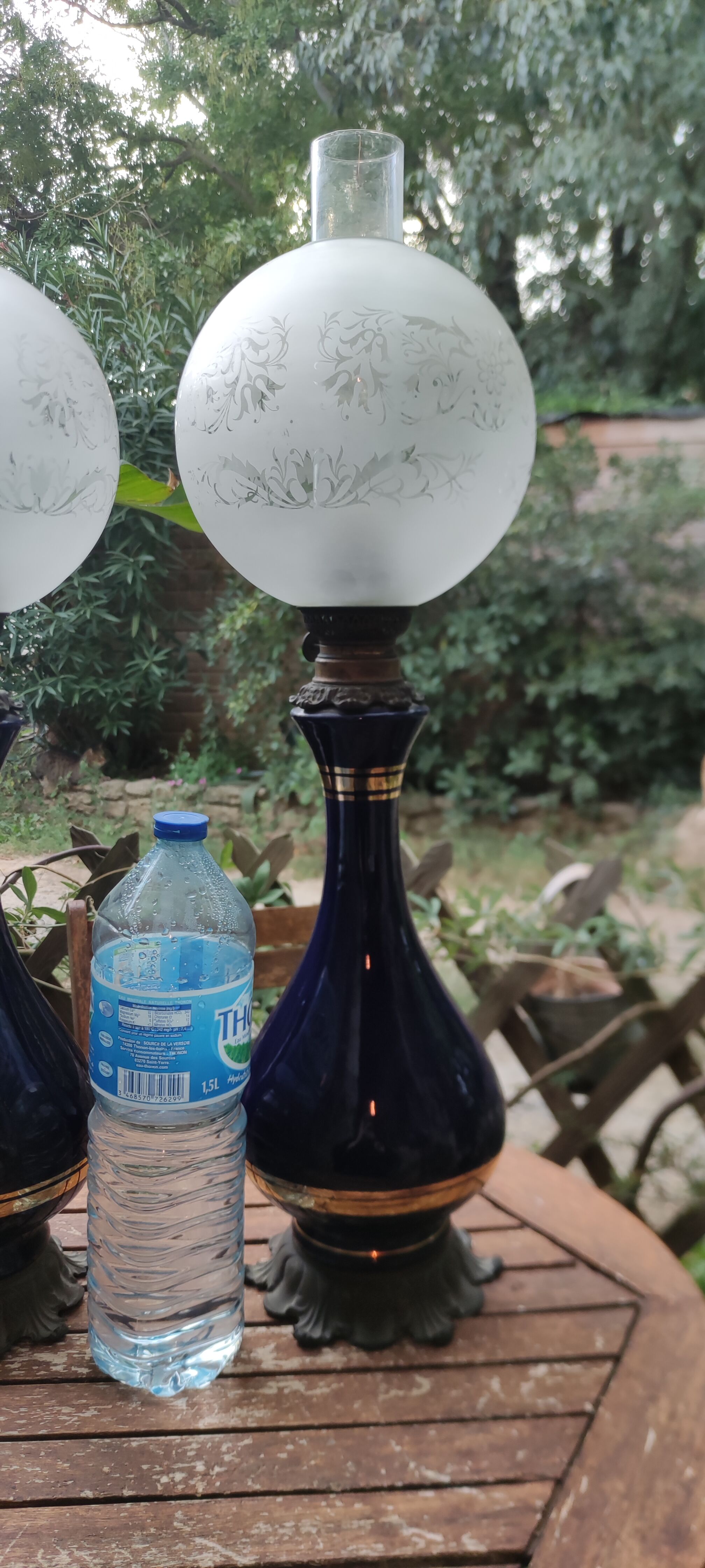 Pair of dark blue kerosene lamps