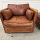 Club armchair and its ottoman 1980s