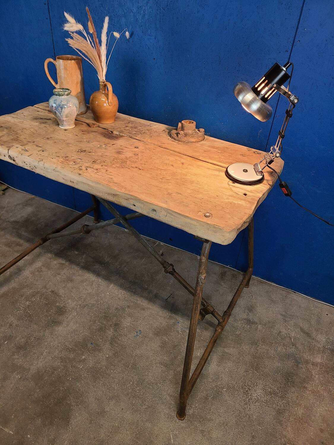 Vintage workbench circa 1930, folding metal leg.
