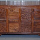 Set of hardwood dressers with finely carved bases.