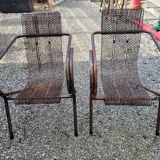 Pair of perforated metal armchairs by René Malaval 1950