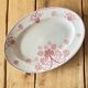Pink plate made of iron earth