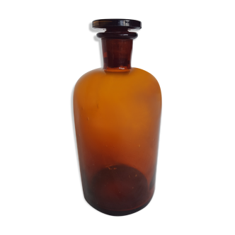 Flacon d'apothicaire en verre brun ambré