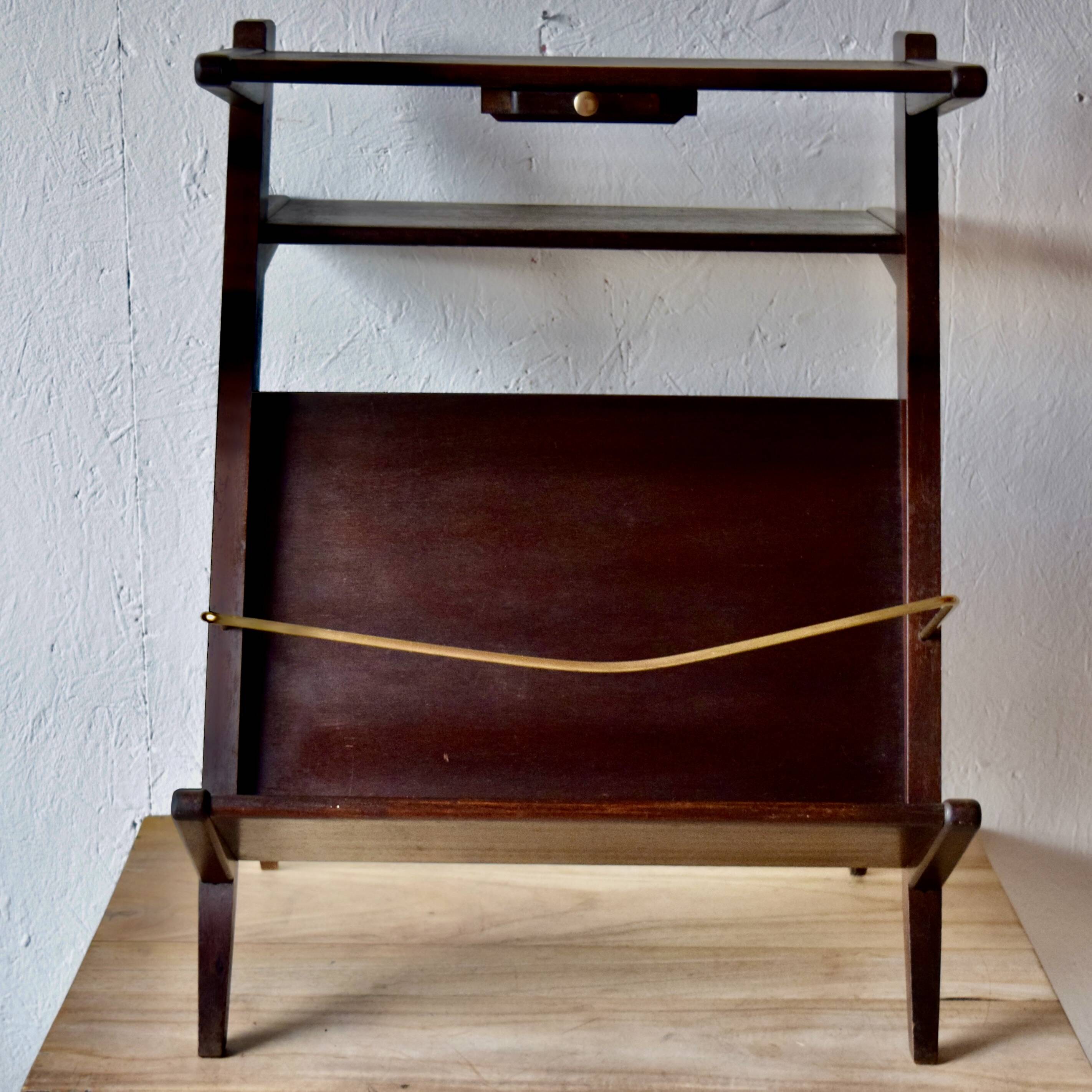 Old Scandinavian style magazine rack in dark wood with integrated brass ashtray