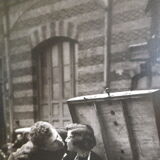 Robert Doisneau's black and white poster "Kiss Blottot" from 1950