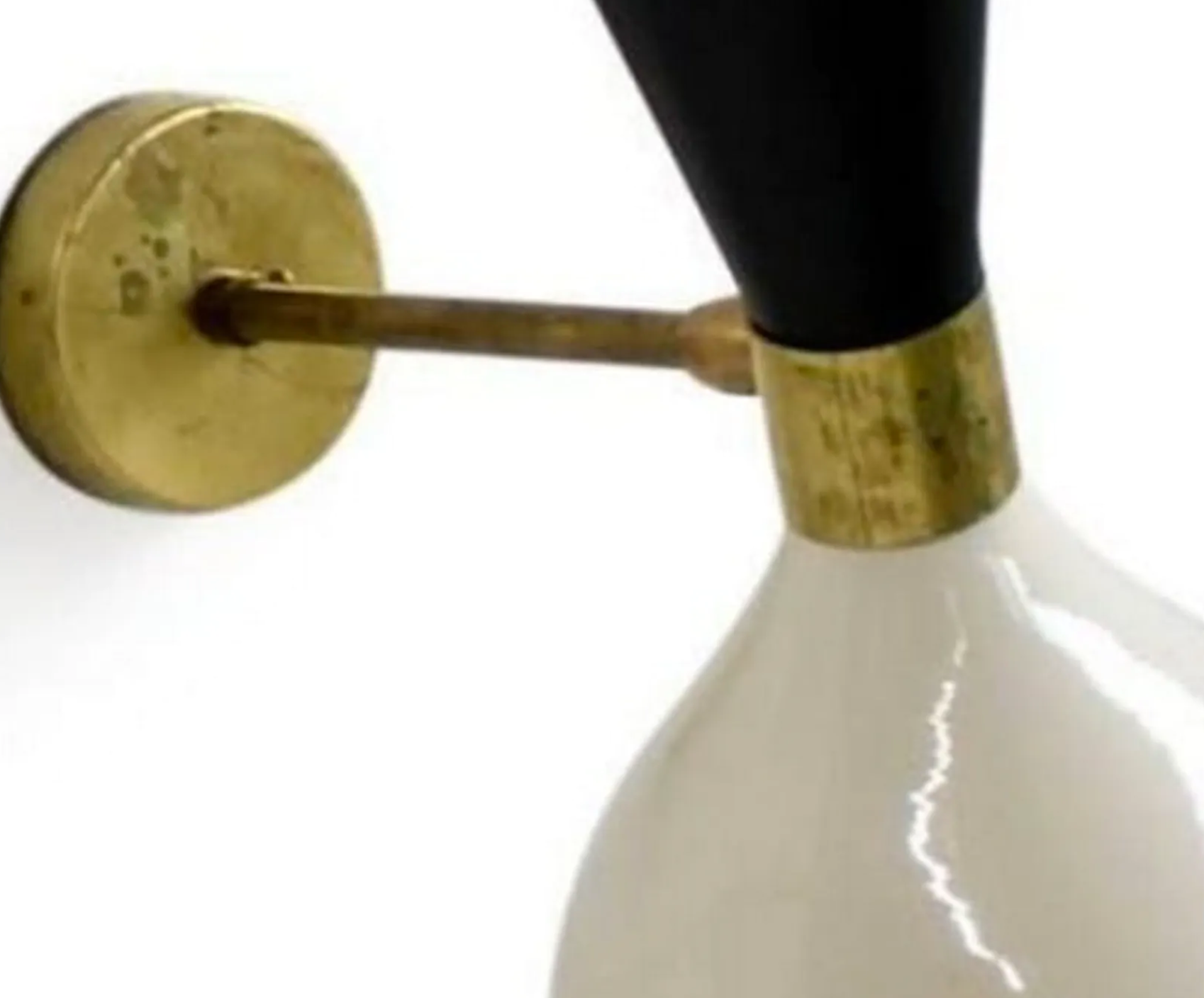 Pair of wall sconces in the style of Italian creations of the 50s