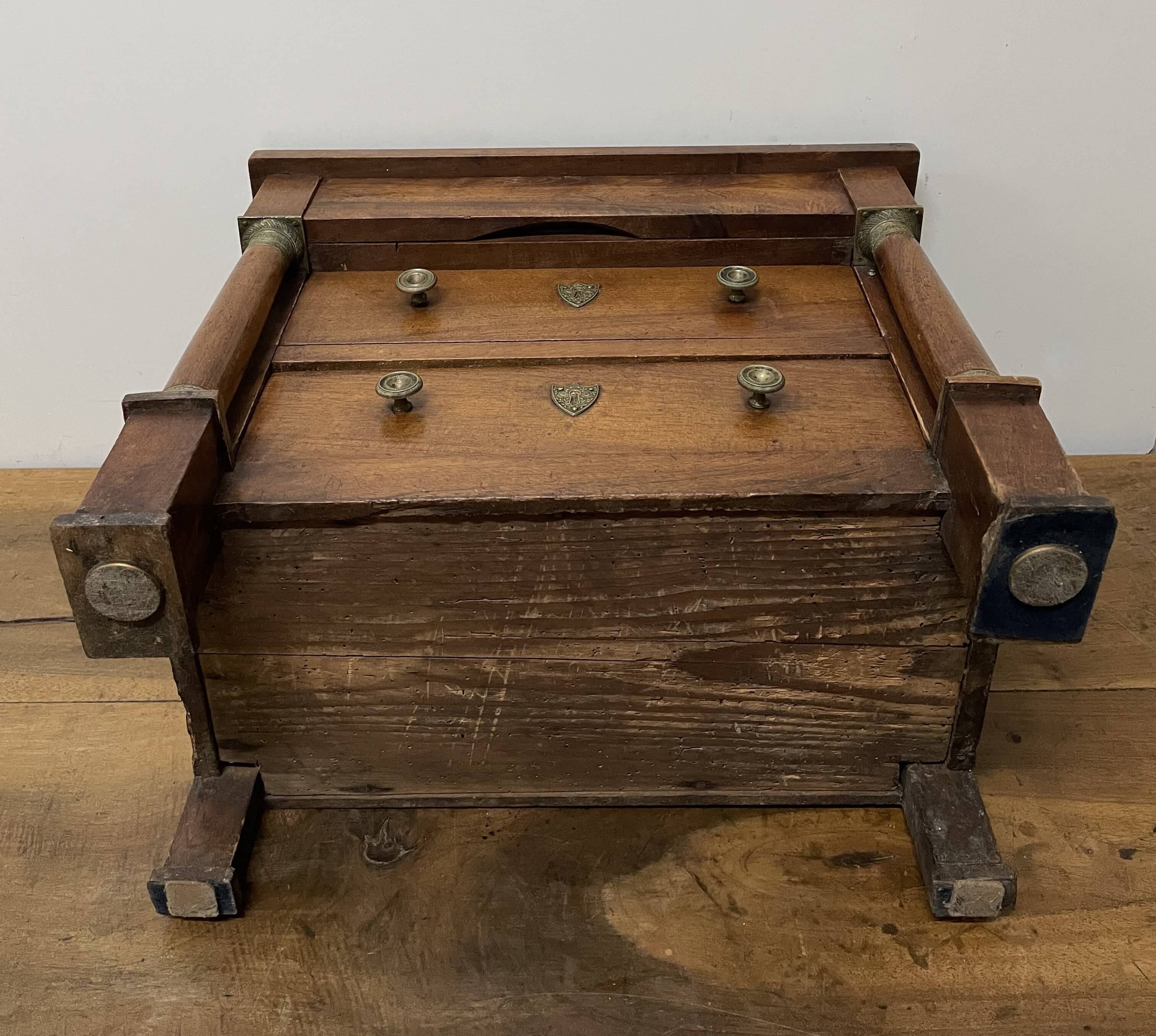 19th century Empire style walnut chest of drawers. It opens with 3 drawers in