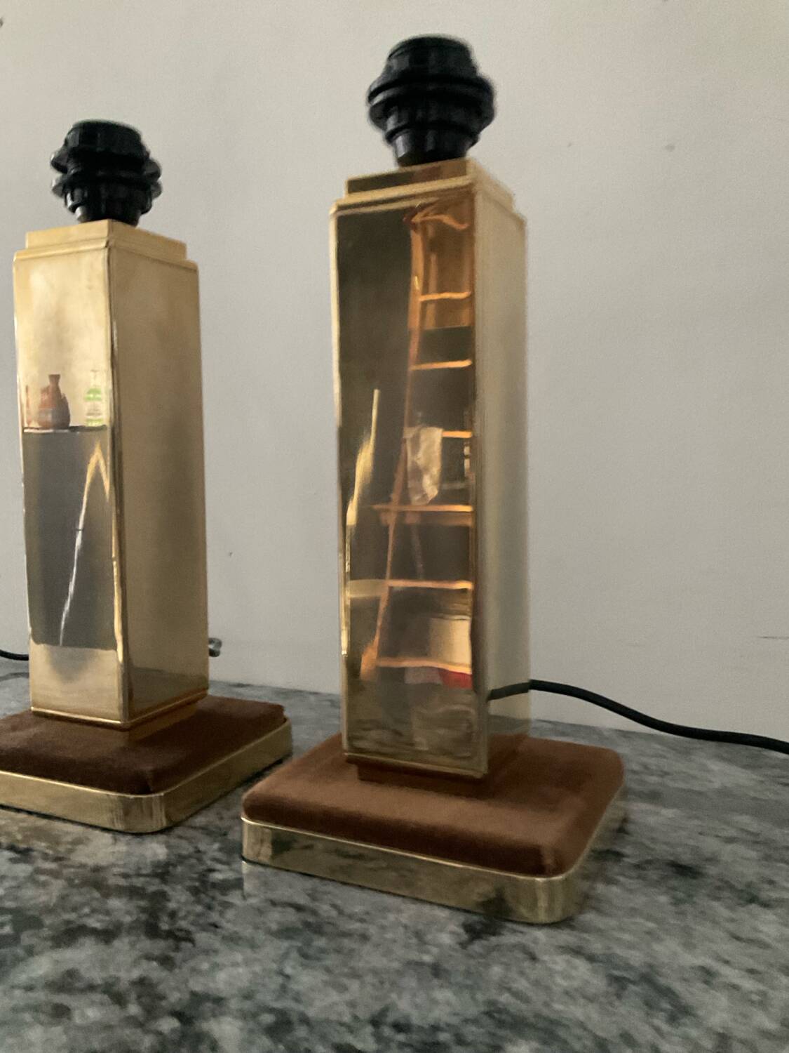 Pair of Hollywood Regency brass table lamps from the 1970s.
