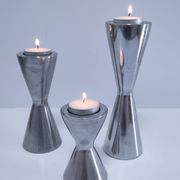 three "diabolo" aluminium design candle holders 90