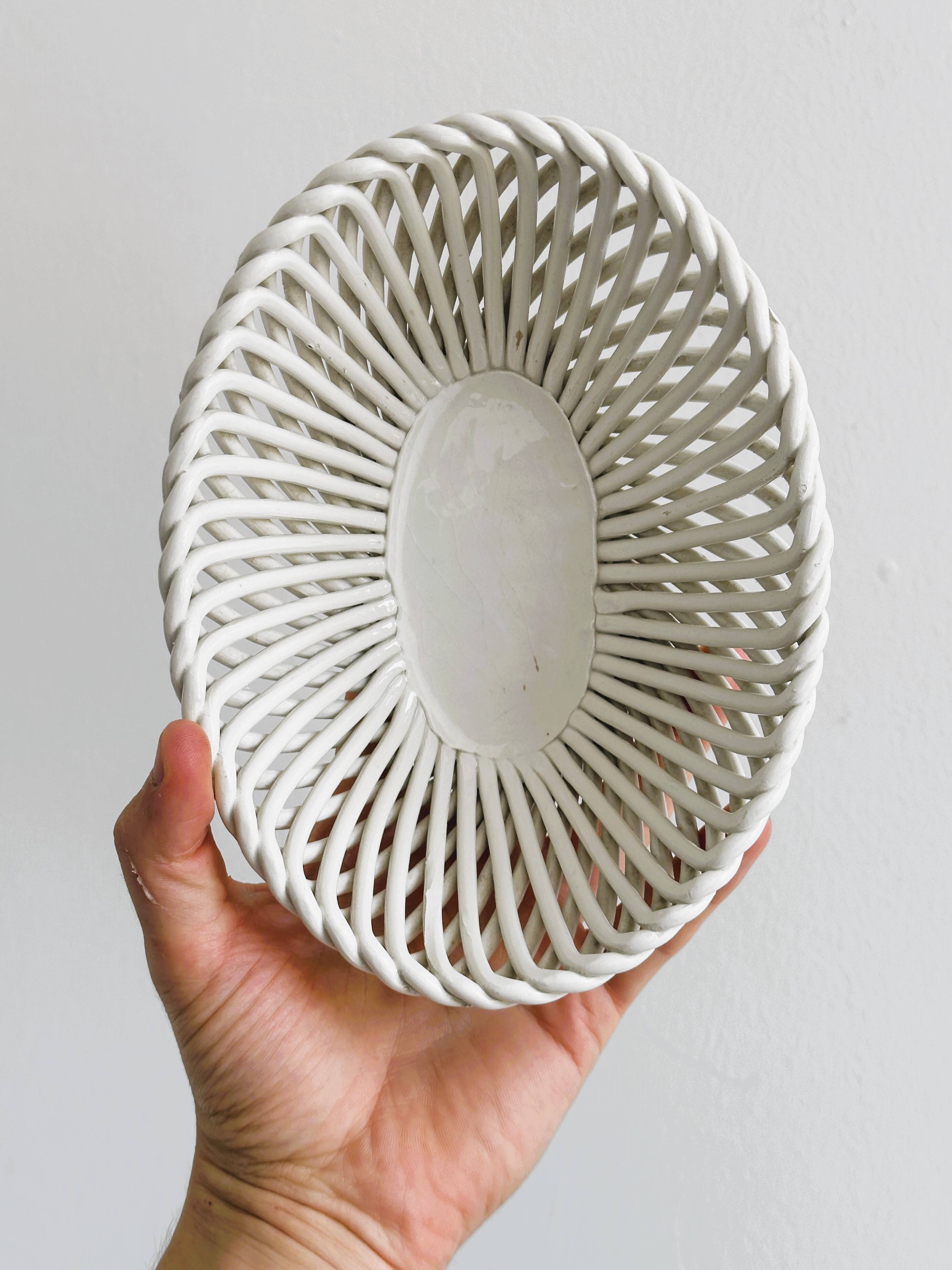 Small white ceramic twisted basket