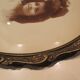 Old wall frame in carved wood and gilded stucco, oval