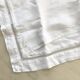 Duo of openwork linen pillowcases