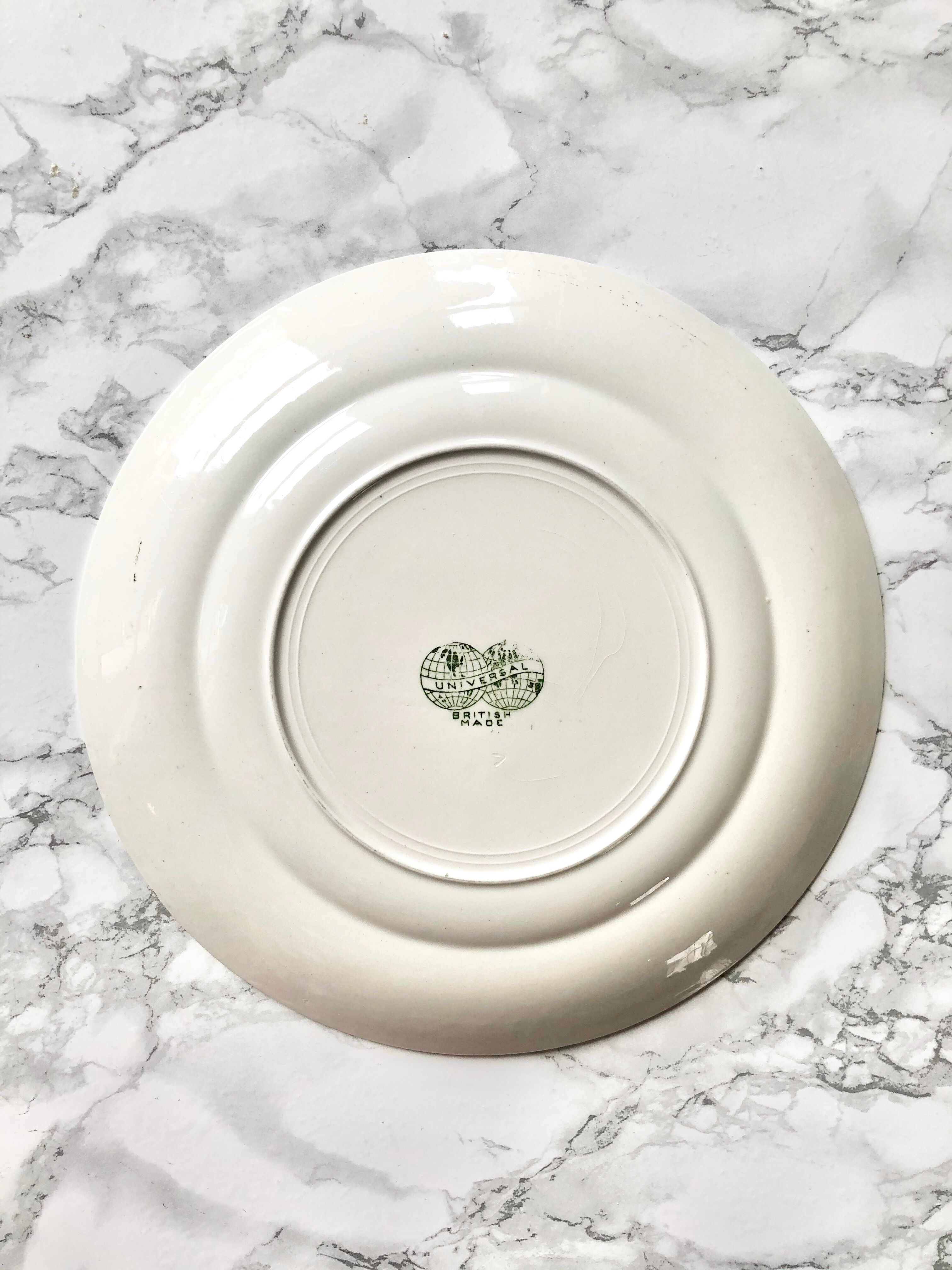 Pair of old English plates with green printed decoration, Universal English Manufacture