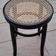 Wooden and cane stool