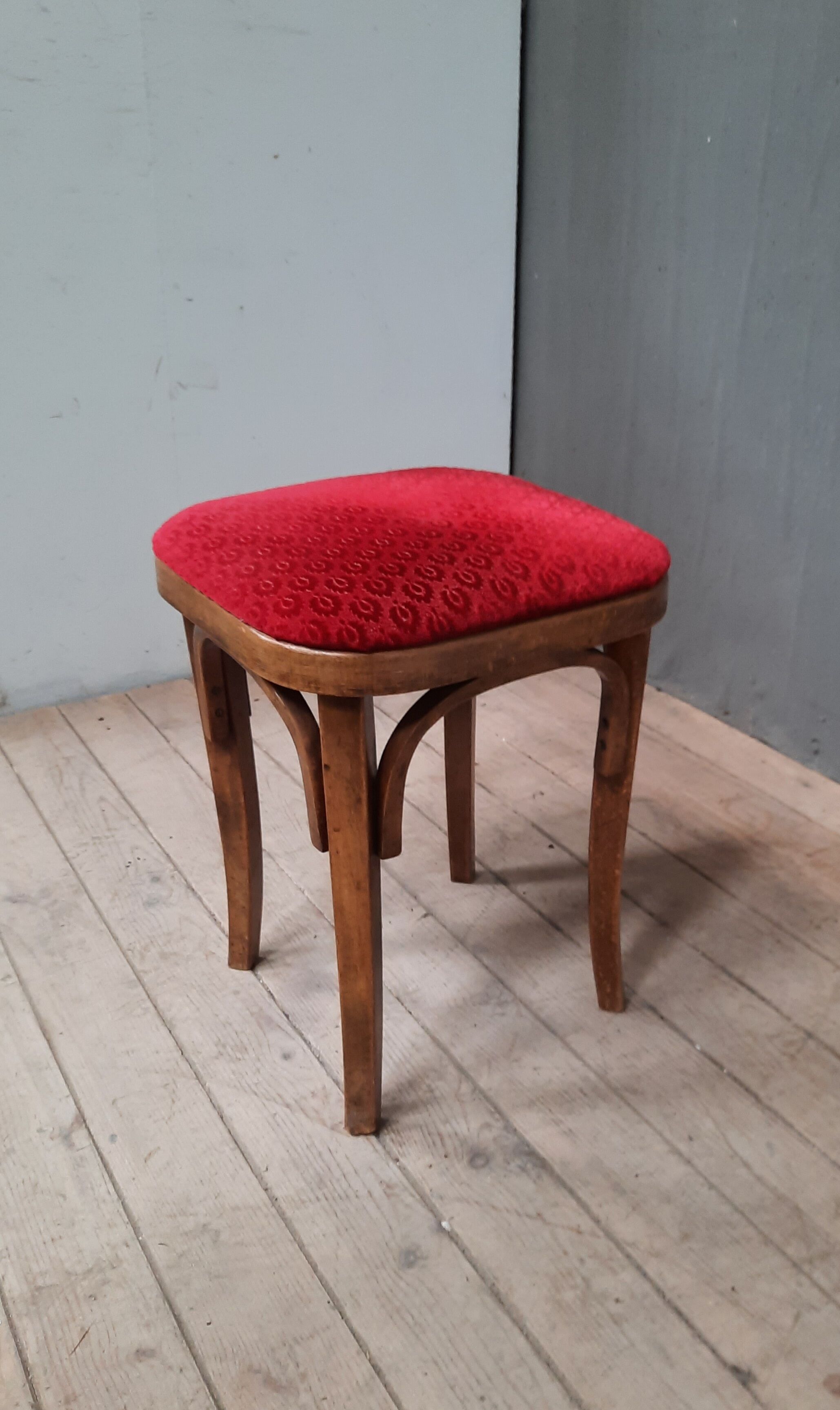 Curved wooden stool