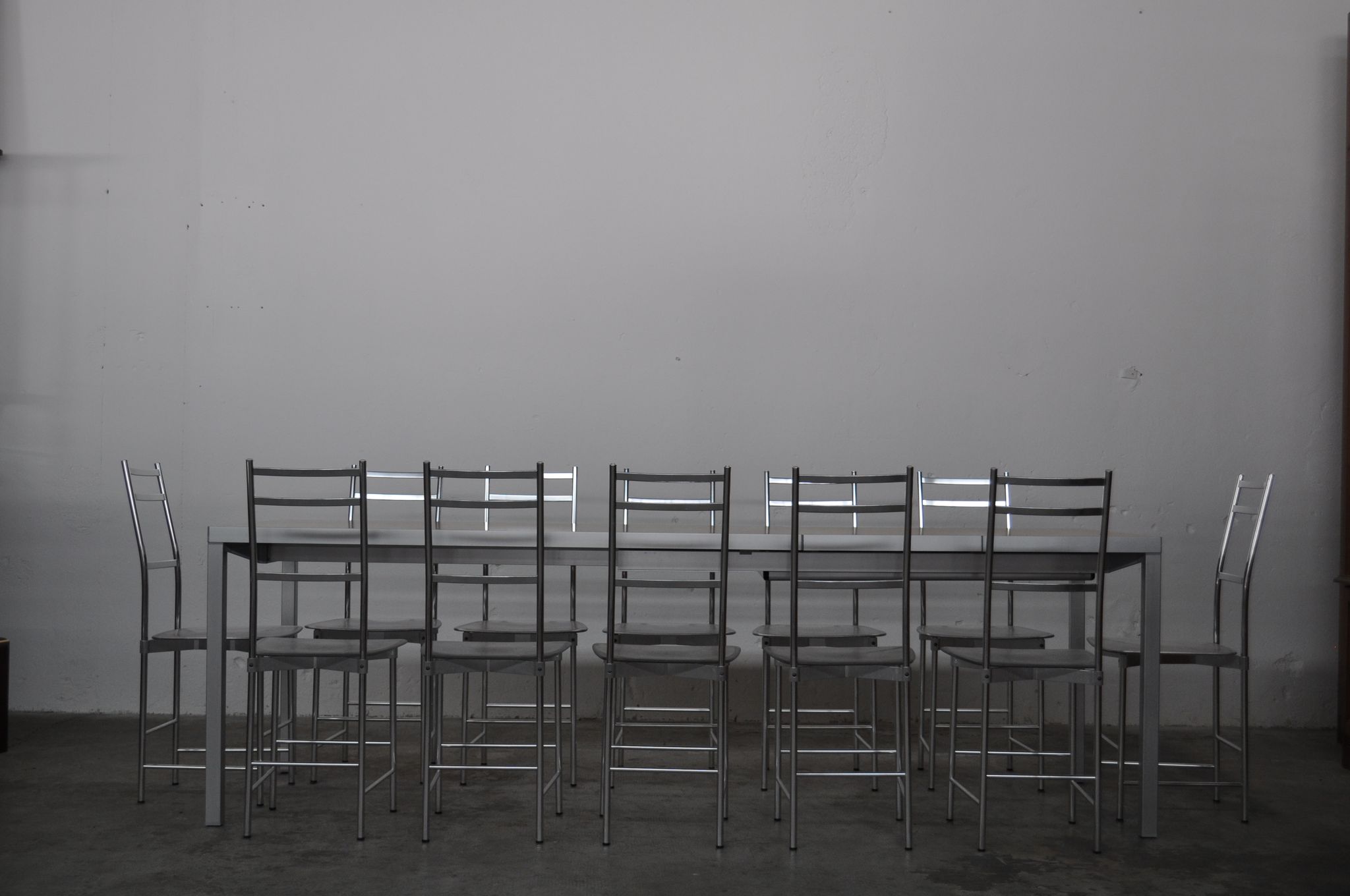 Bagutta Table and Aluminum Chairs by Opera Design for Ycami, 1980s, Set of 13