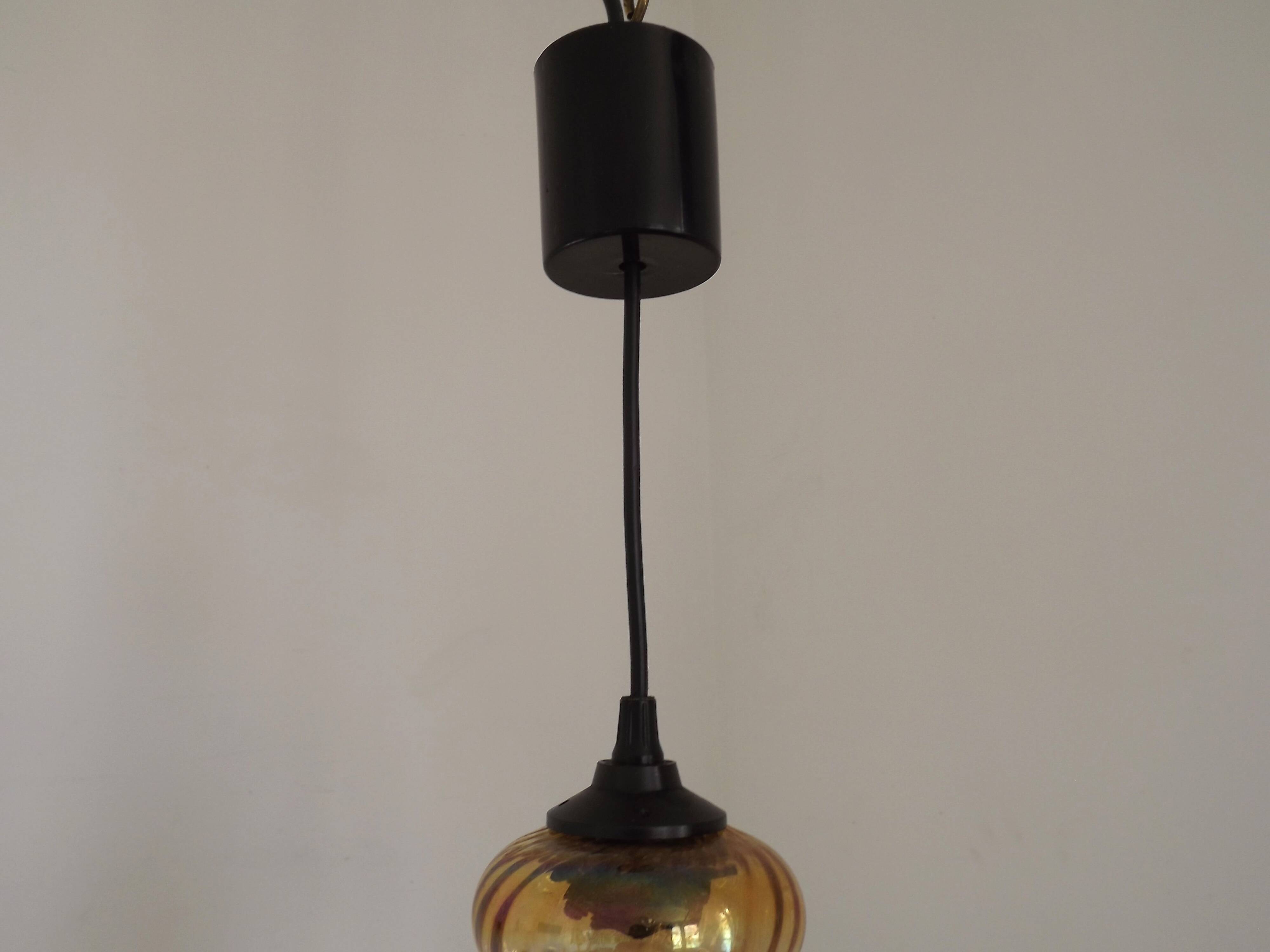 French vintage amber and clear glass ceiling light with white floral decoration.