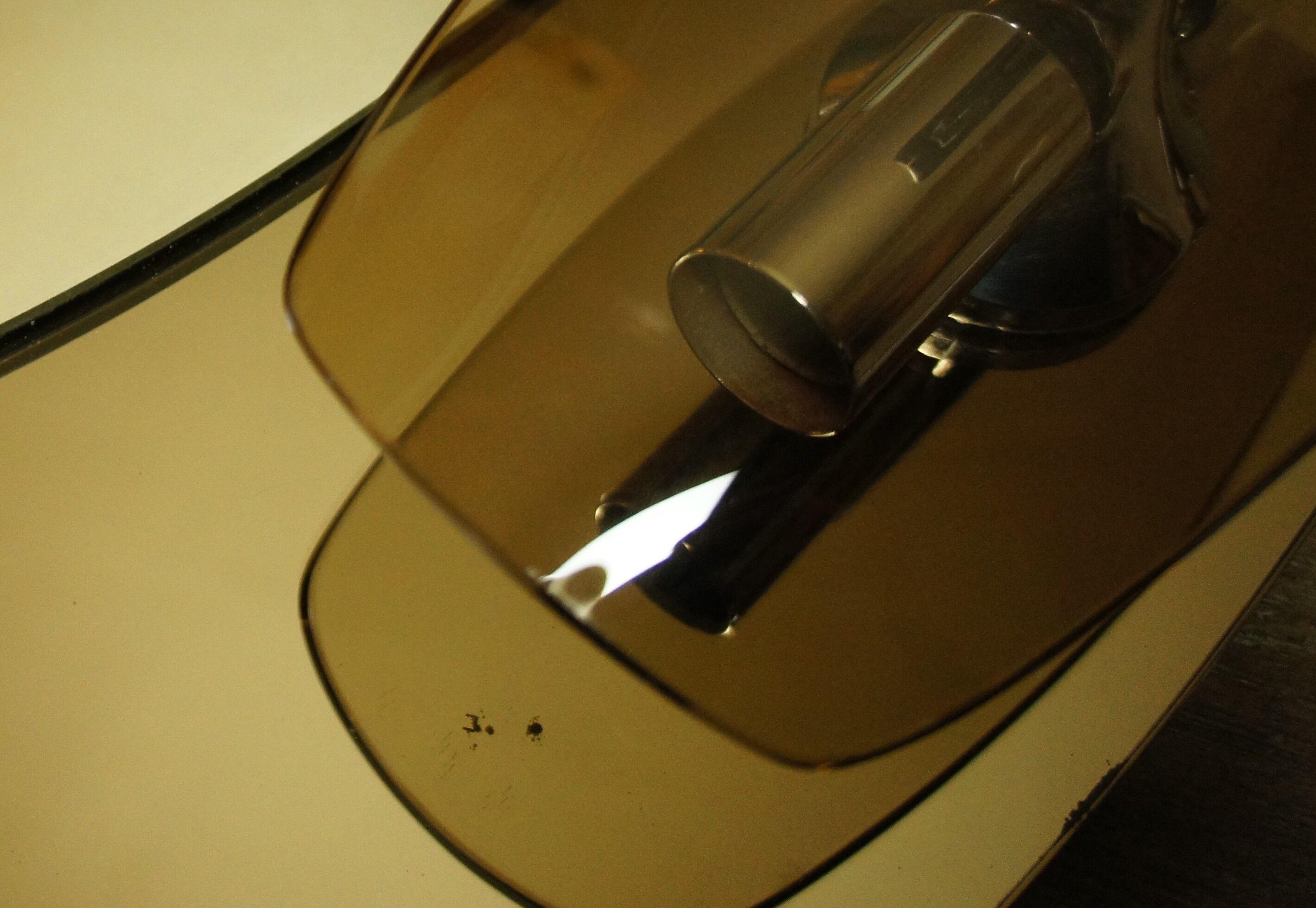 Light mirror in bronze tinted curved smoked glass