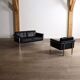 Horst Brüning Model 6912 two seater sofa in black leather for Kill International, Germany 1967