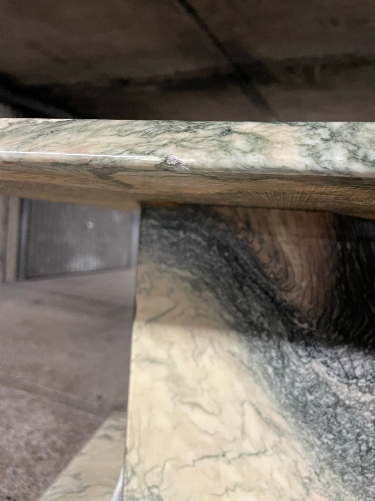 Series of three nesting tables in green marble, 1970
