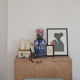 White hand-painted ceramic vase with blue patterns