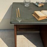 Modernist desk in wood and green moleskin upholstery