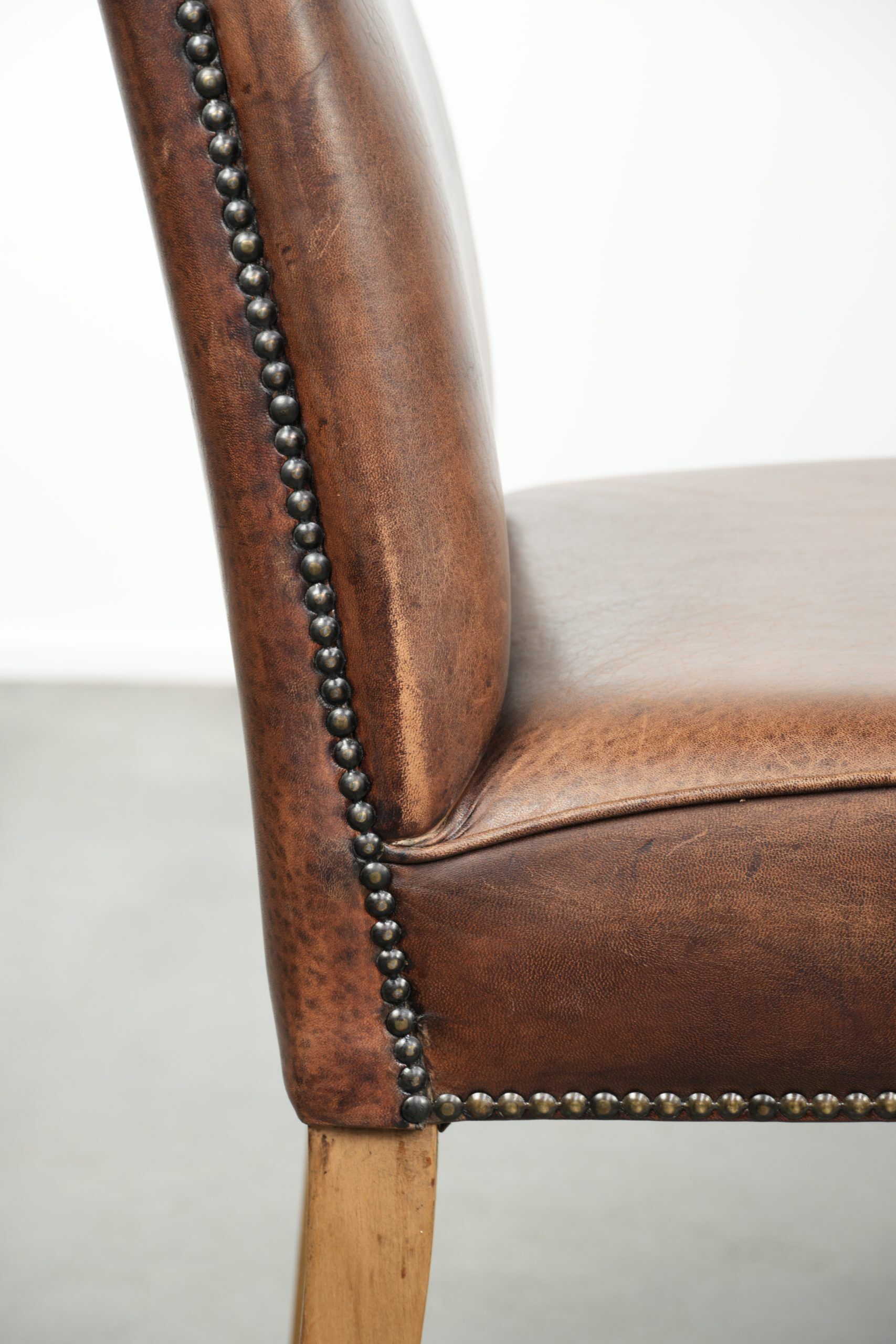 Vintage set of 4 dining chairs made of sheepskin leather with a high back