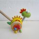 Push toy, wooden dinosaur. Brand: Bino