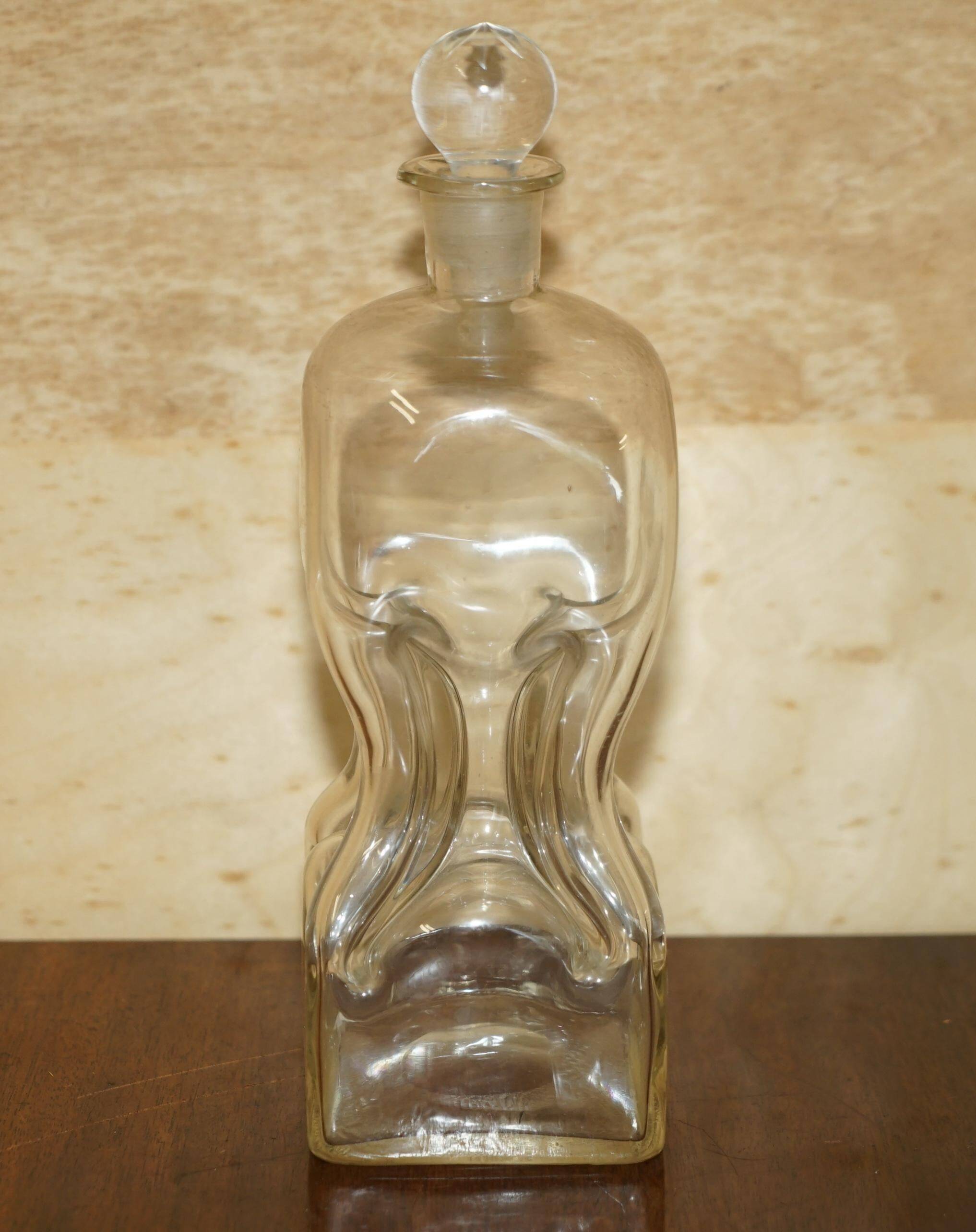 Pair of antique pinched decanters circa 1900 for serving whisky, bourbon, vodka, gin.