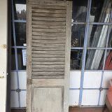 Old fir shuttered door