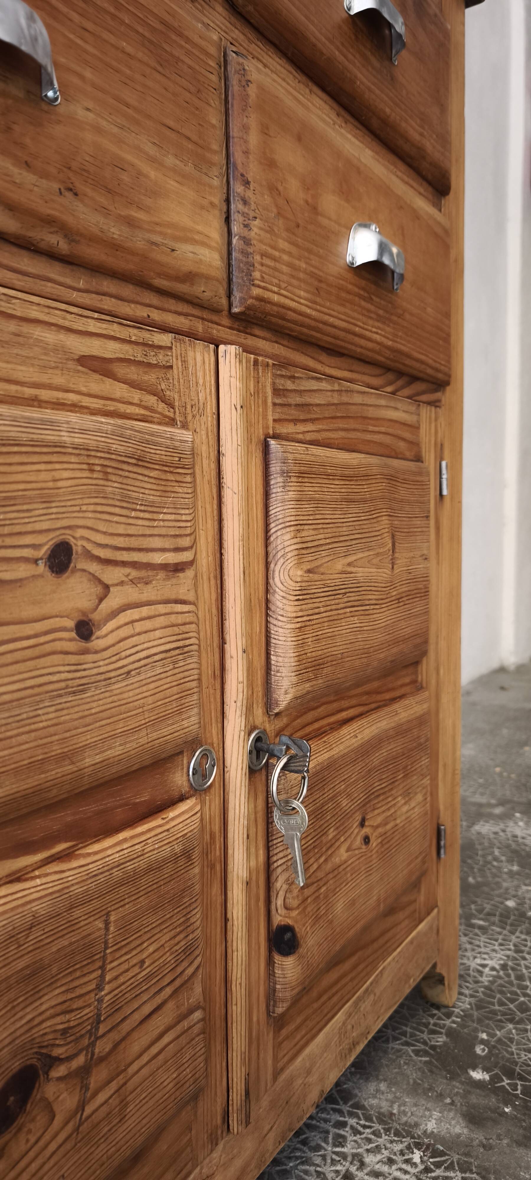 Small antique workshop furniture made of solid wood.