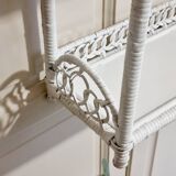 White woven wicker shelf