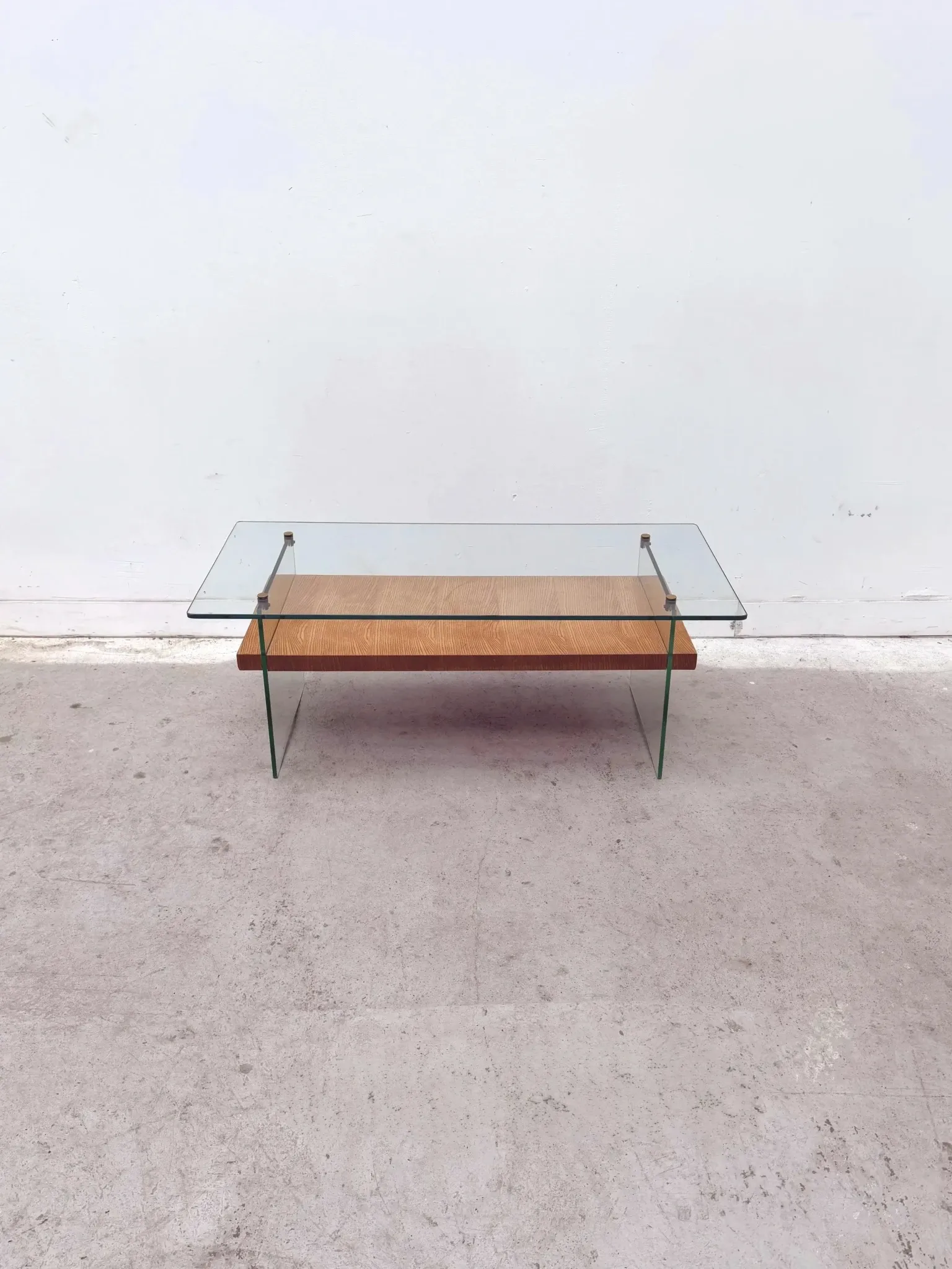 Coffee table by Robert Debiève in ash veneer, glass and brass, France 1950.
