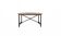 Industrial black dining table with a lacquered oak top and metal base.